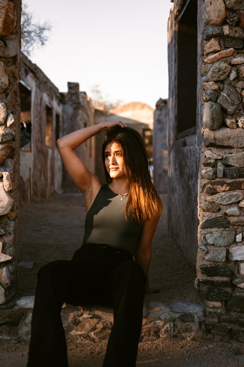 Woman Posing with Hand on Hair