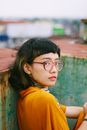Girl in Glasses Looking Over Shoulder