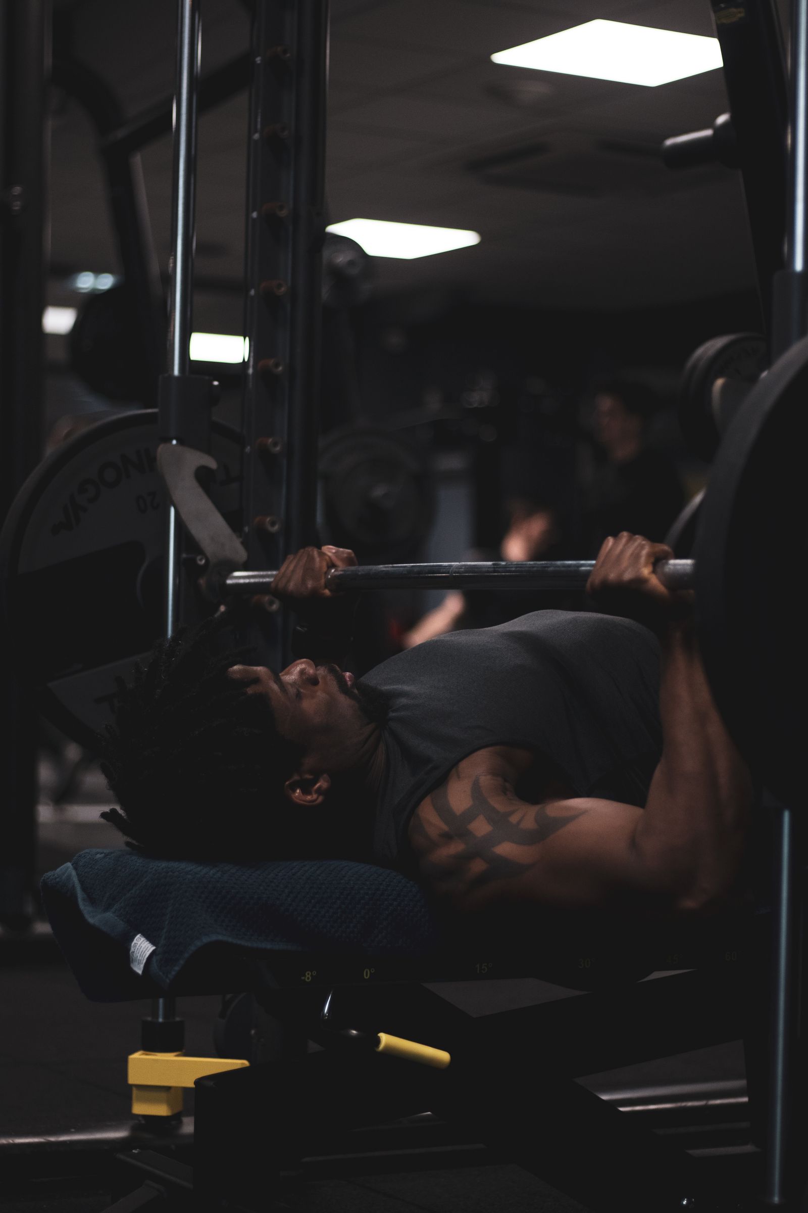 Athlete training under the bar
