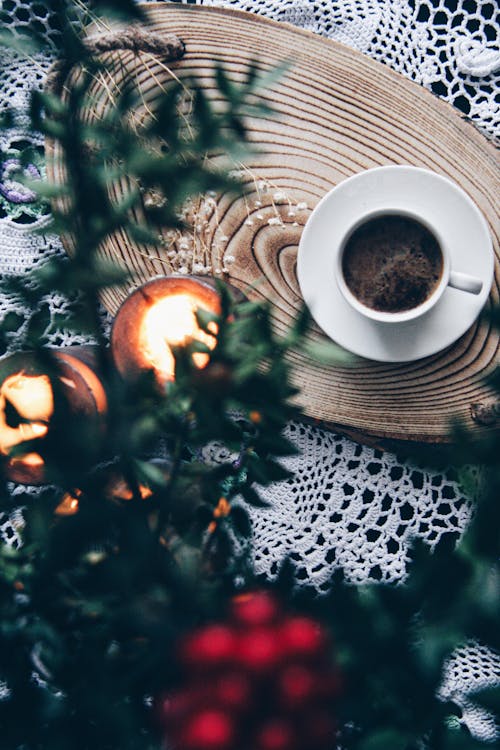 
A Cup of Coffee on a Wooden Board