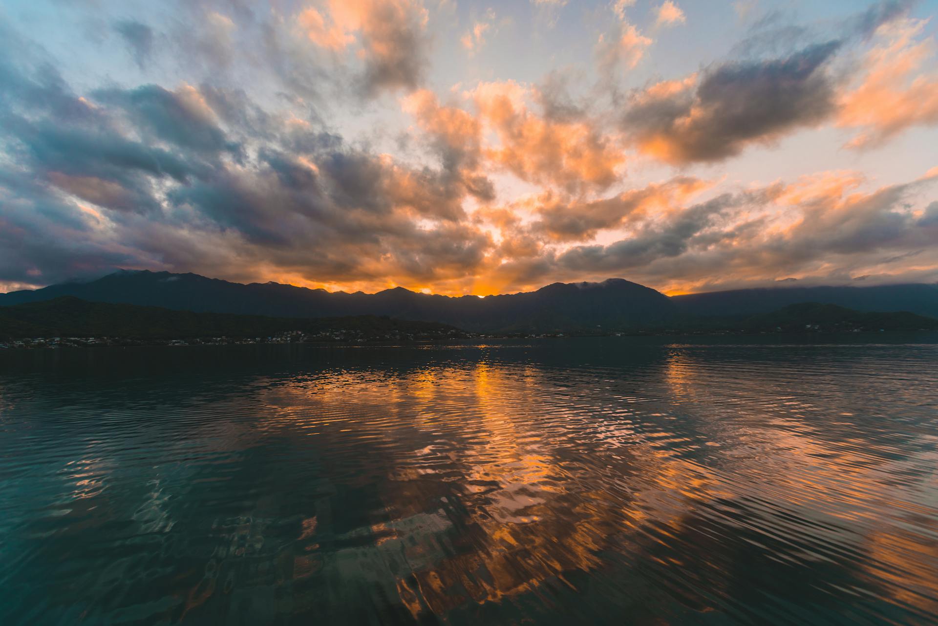 Reflect Photography of Body of Water Near Island