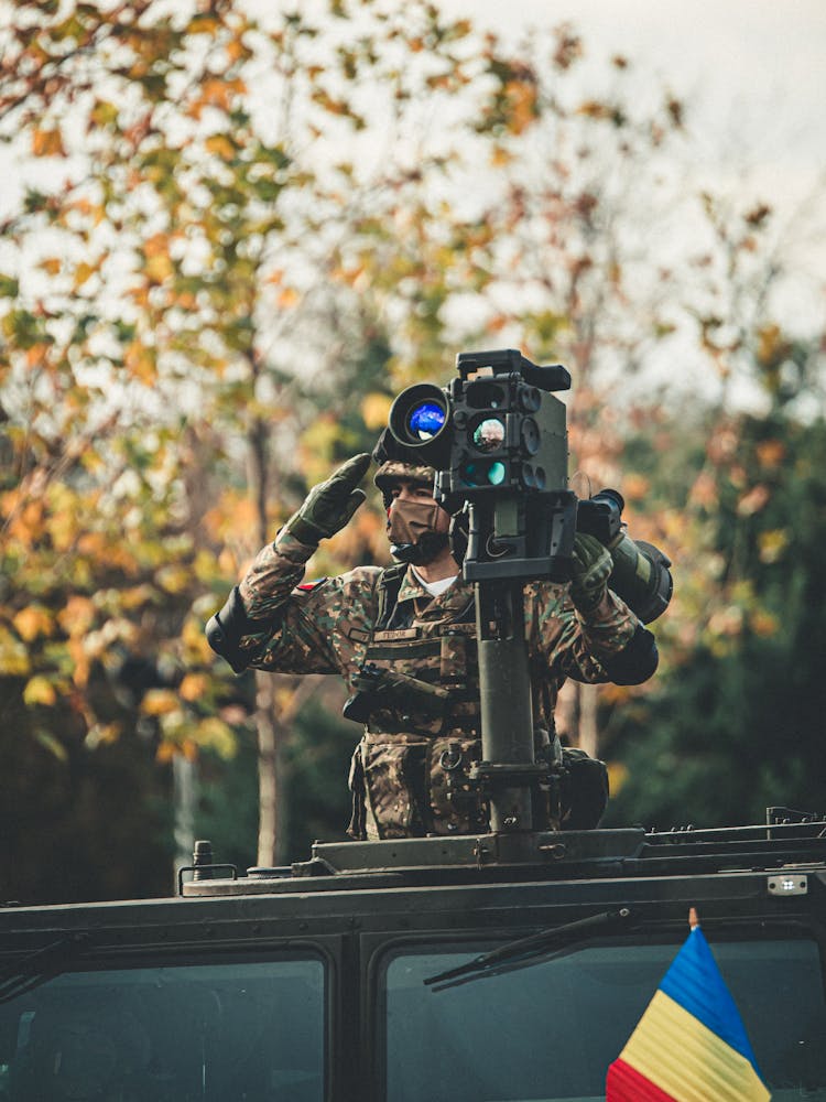 Soldier Saluting From Vehicle