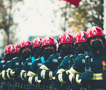 Firemen in Uniforms in Line