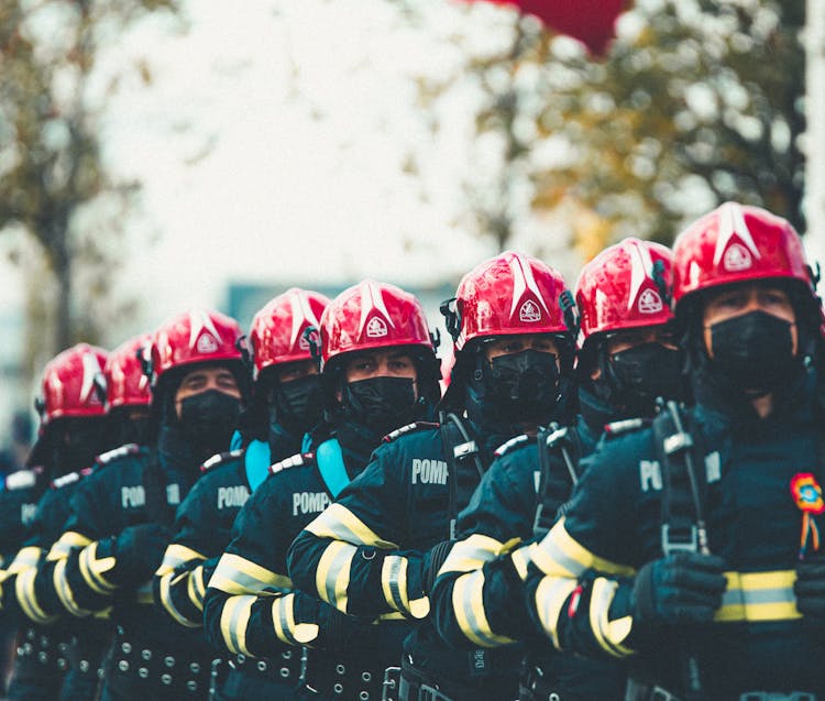 Firemen In Uniforms In Line