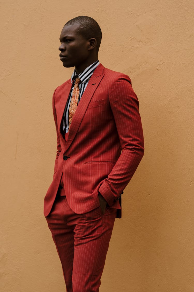 Male Model Posing In Red Suit