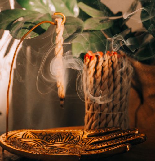 Free Beautiful close-up of incense burning, emitting aromatic smoke in a calming setting. Stock Photo