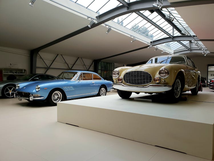 Classic Cars On Display In The Showroom