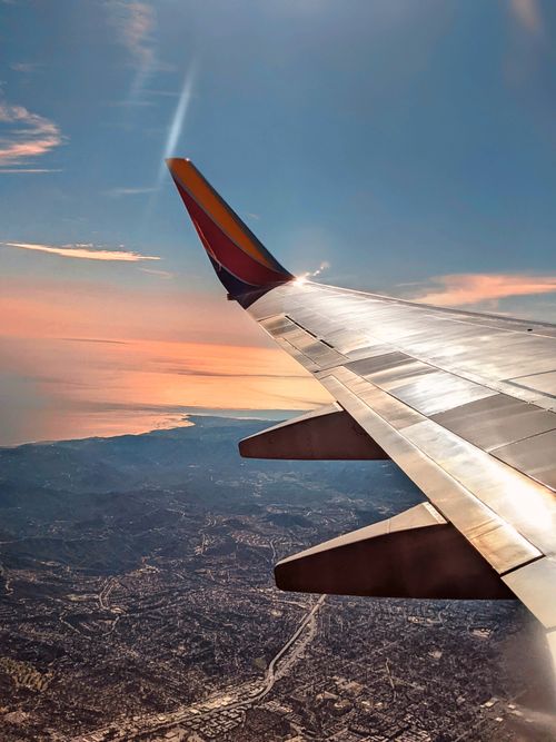 Free stock photo of airplane, airplane window, beautiful sunset Stock Photo