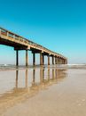 Reflection of the St. Augustine Beach Pier on the Coast