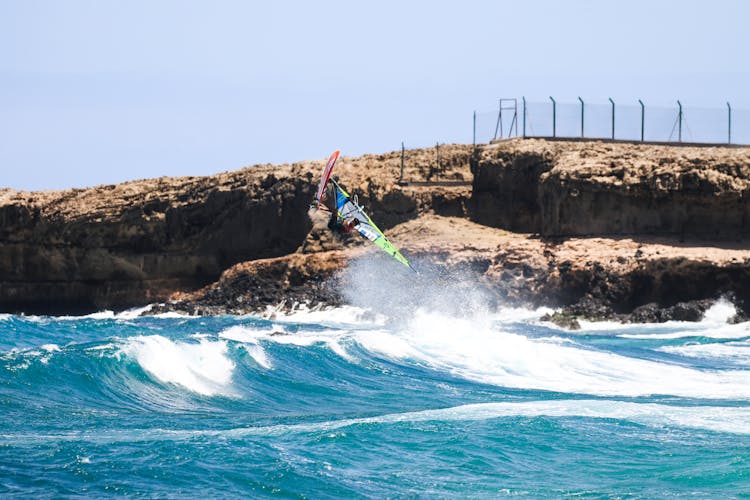 Man Windsurfing Near Shore