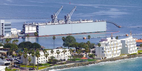 Cargo Ship in Water near Waterfront City