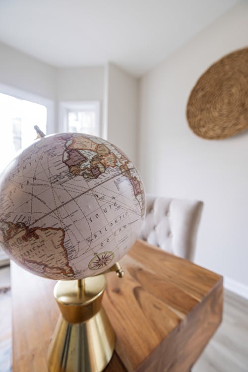 A Globe on the Wooden Table