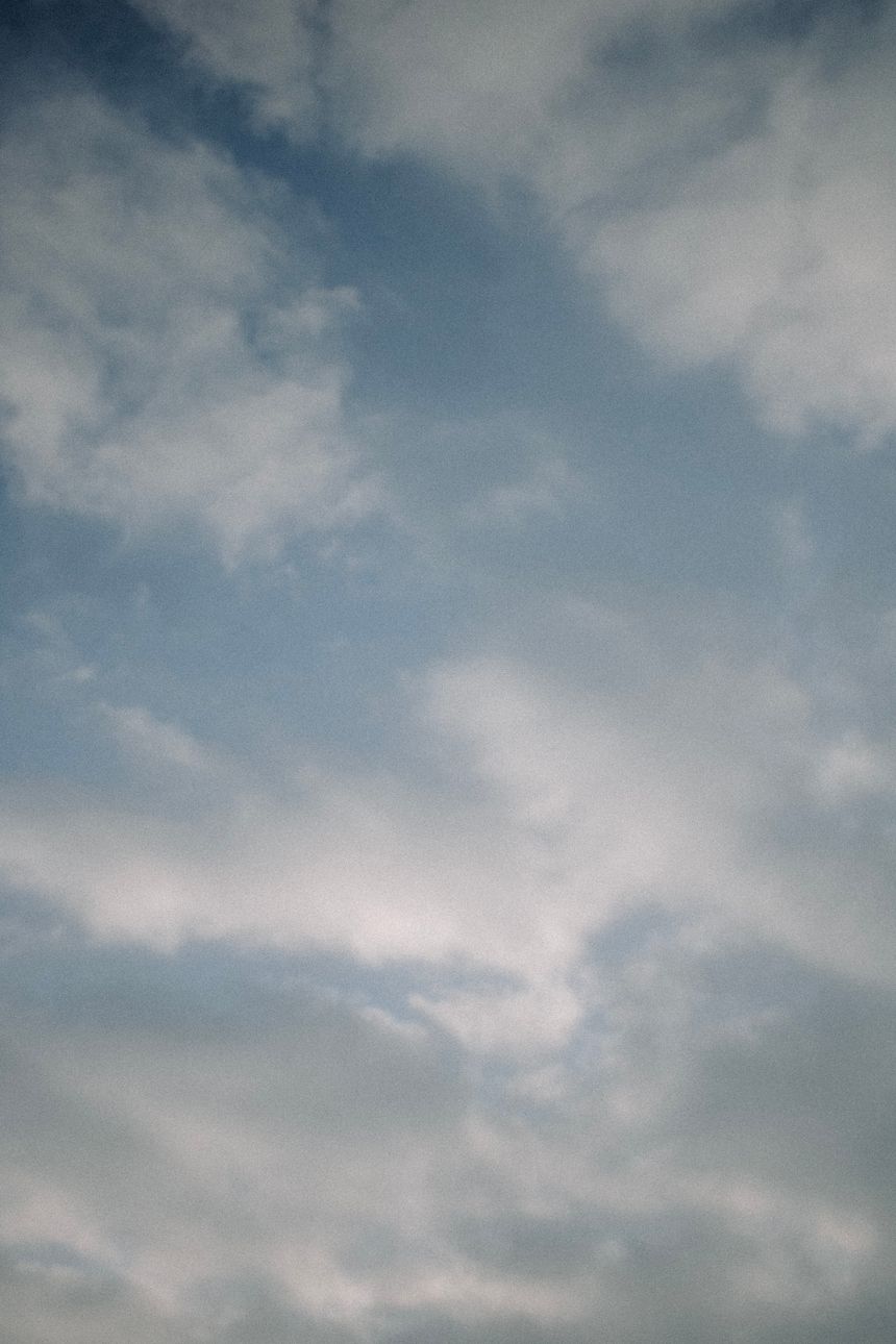 A calm sky filled with soft clouds and gentle atmospheric light, photo by Aynur Latfullin on Pexels