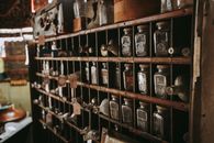 Antique Bottles on an Apothecary Shelf