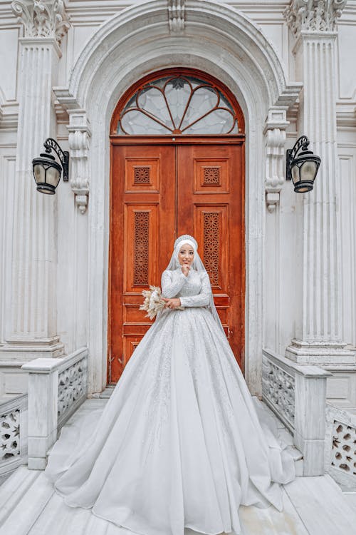 Woman Posing in Wedding Dress