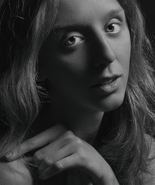 Free Artistic close-up black and white portrait of a thoughtful woman. Stock Photo