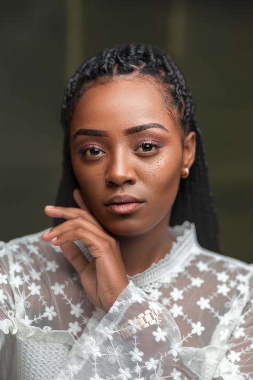 A Portrait of a Woman with Braided Hair