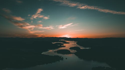 Silhouette of Body of Water