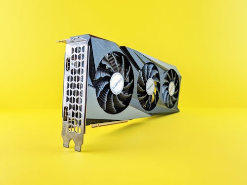 Computer Fan on Yellow Background