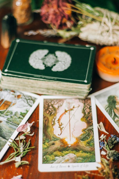 Free Tarot Cards on a Wooden Surface Stock Photo