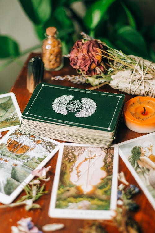 Free Tarot Cards and Dry Flowers Stock Photo
