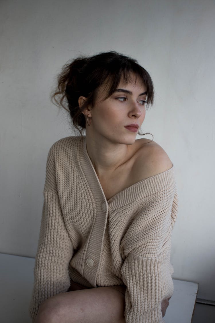 Woman In Knitted Cardigan