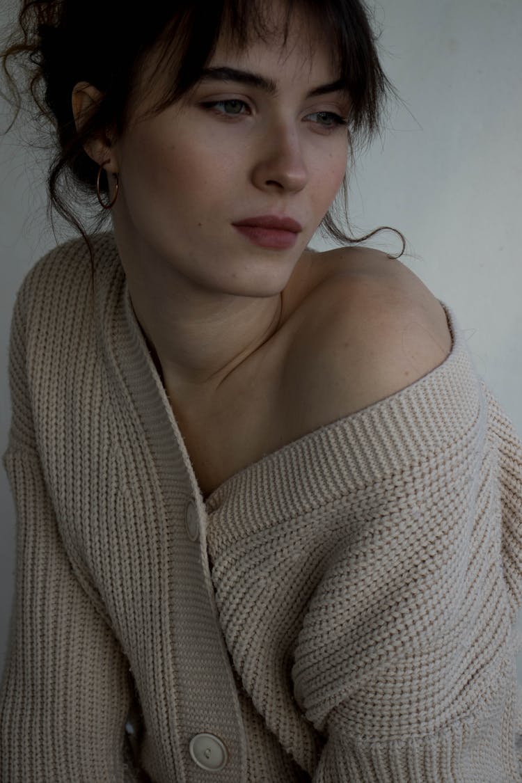 Close Up Photo Of Woman In A Cardigan