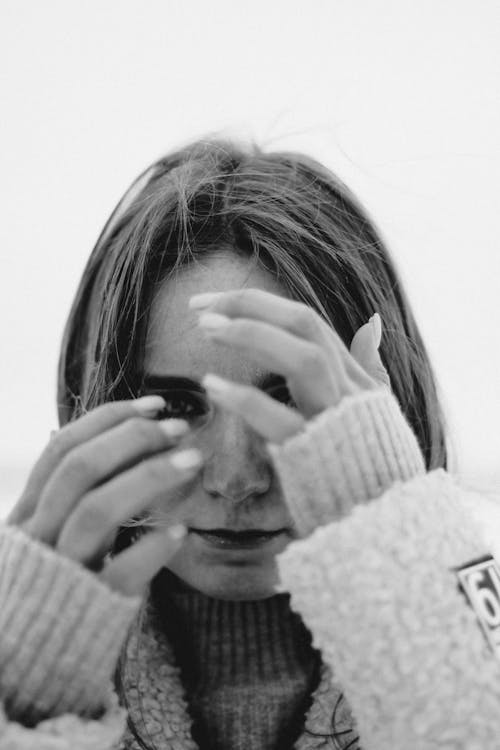 Free Black and White Photo of Woman with Her Hands Near Her Face Stock Photo