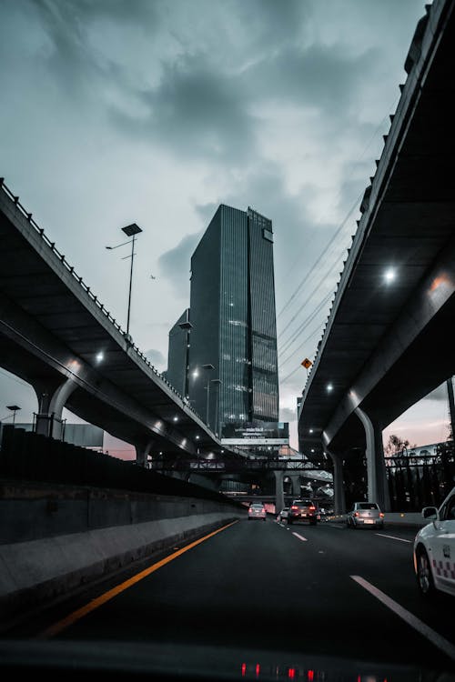 Cars on Road Under a Bridge