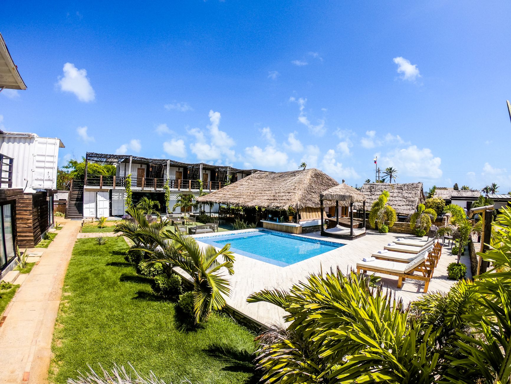 Palm-shaded pool deck at a Lekki hotel