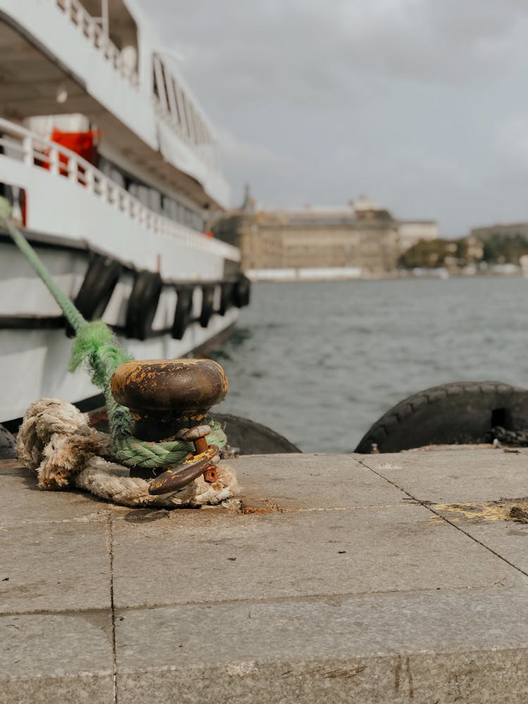 Green Rope Tied On A Bollard