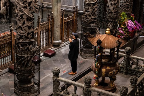 Man Praying in Temple