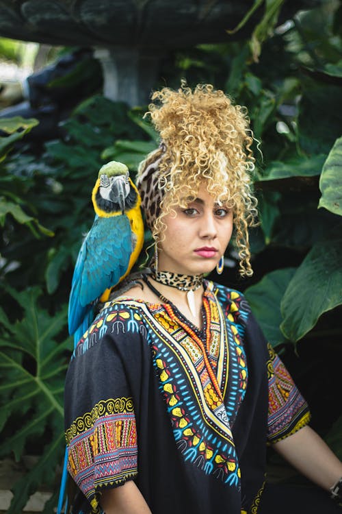 Macaw Bird on Woman's Shoulder