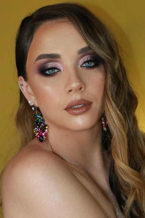 Close Up Photo of a Woman Wearing Makeup