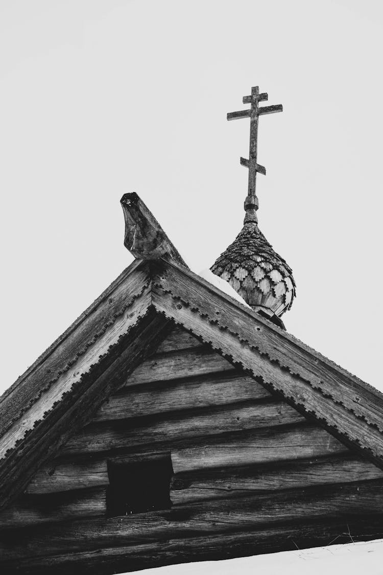 Cross On A Wooden Roof 