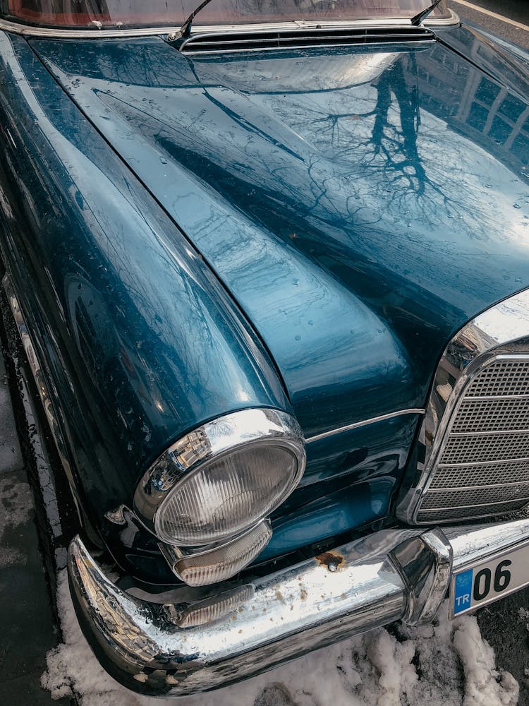 Blue Shiny Car In Close-up Photography