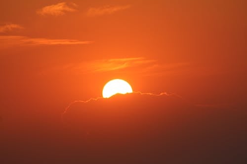 Free The Sun Across the Orange Sky  Stock Photo