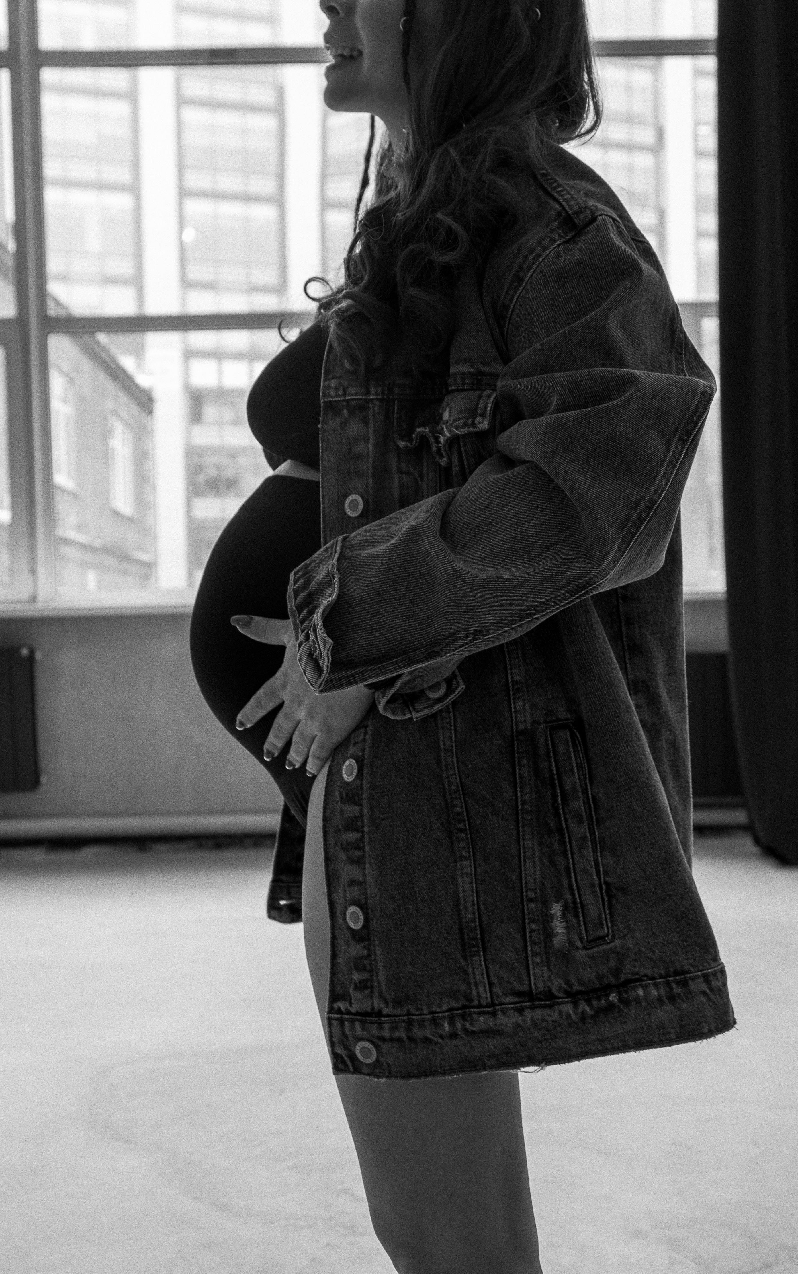 A Pregnant Woman in a Denim Jacket · Free Stock Photo