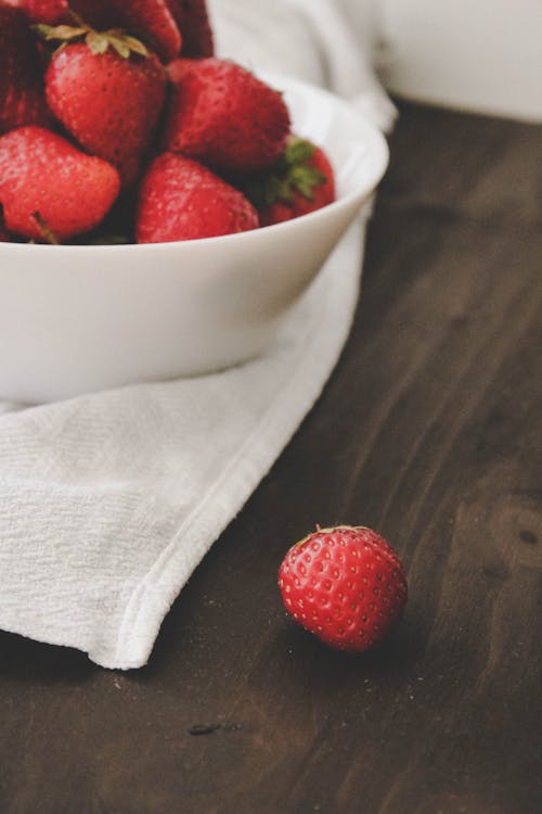 Red Strawberries on White Ceramic Bowl