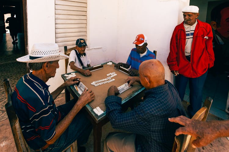 Men Playing Table Game