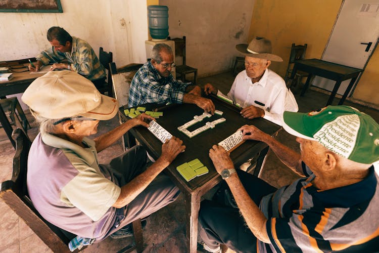 Elderly Men Playing Mahjong