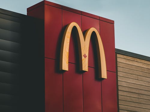 Free Canadian Maple Leaf on Wall with McDonalds Logo Stock Photo