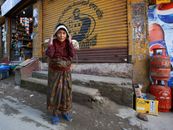 Woman Standing in Street