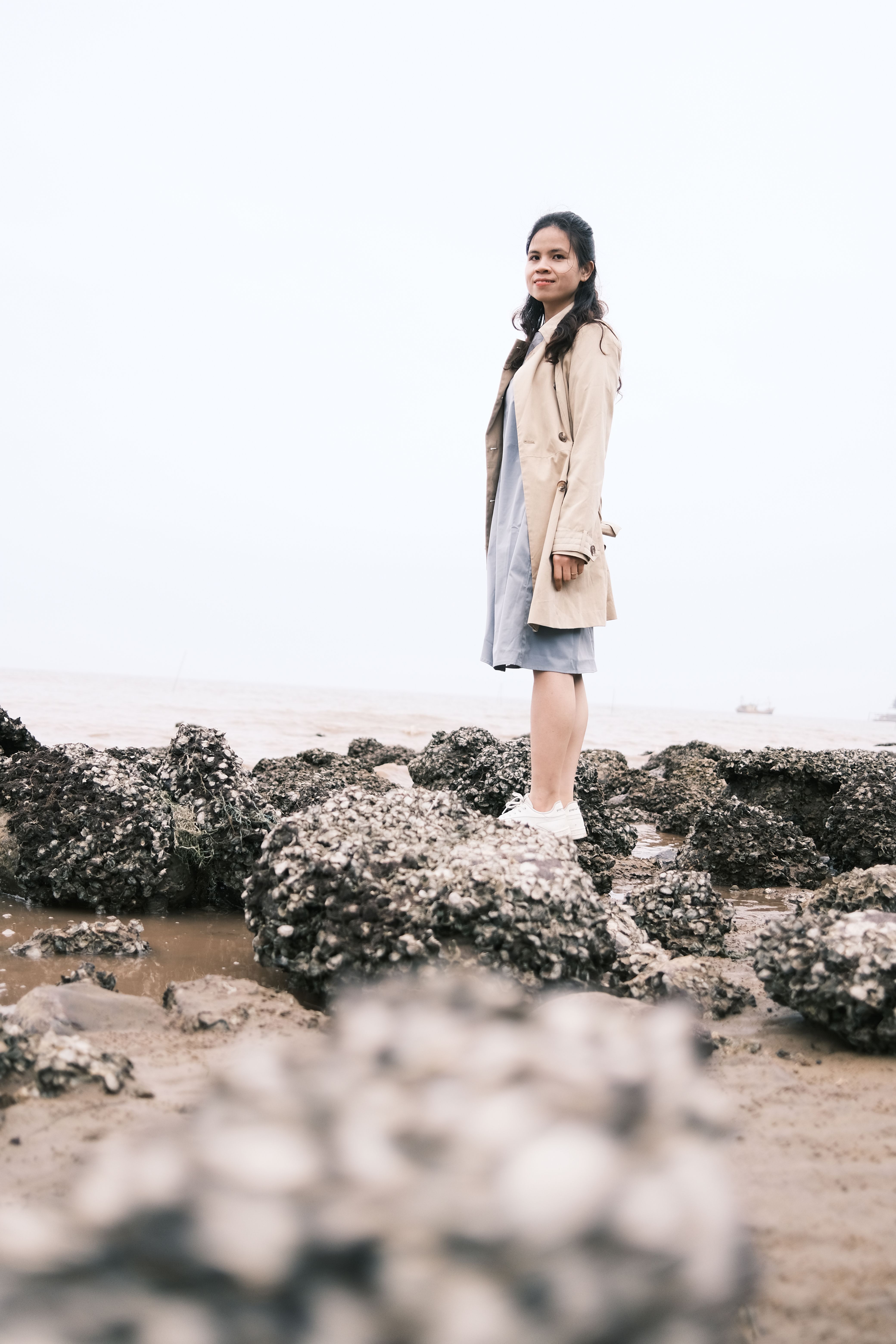 A Woman in a Dress Standing in Water · Free Stock Photo