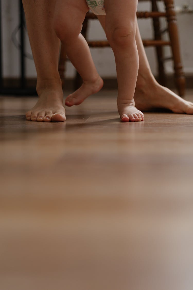 Woman And Baby Legs With Barefoot