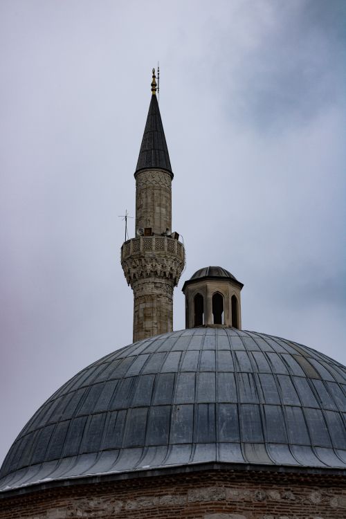 Free A striking view of a minaret and dome exemplifying Ottoman architecture in Istanbul. Stock Photo