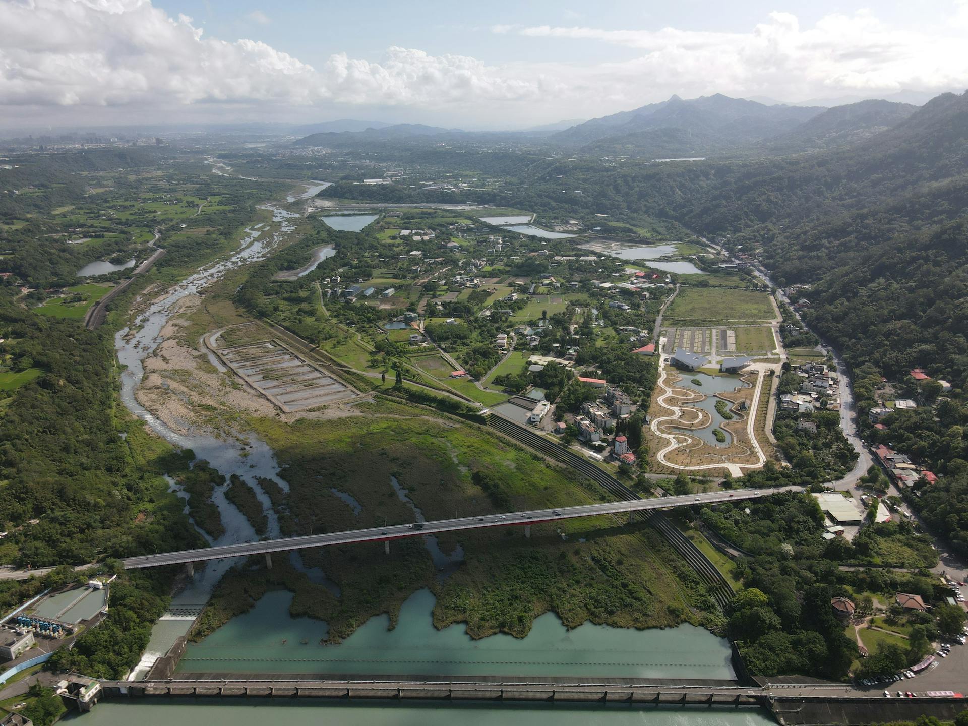 Stunning aerial view of Shimen Reservoir and surrounding landscape in Taoyuan City, Taiwan.