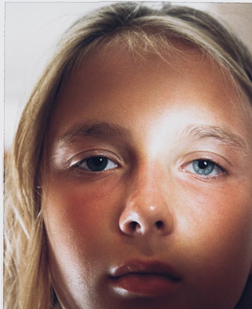 Close Up Photo of Girl's Face