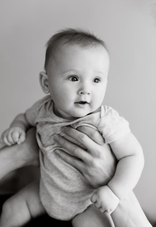 A Person Holding a Baby