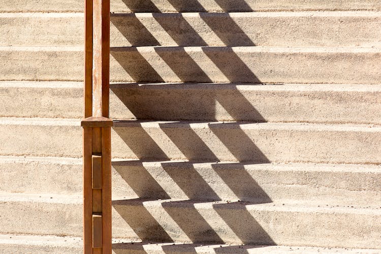 Concrete Steps With Wooden Railing